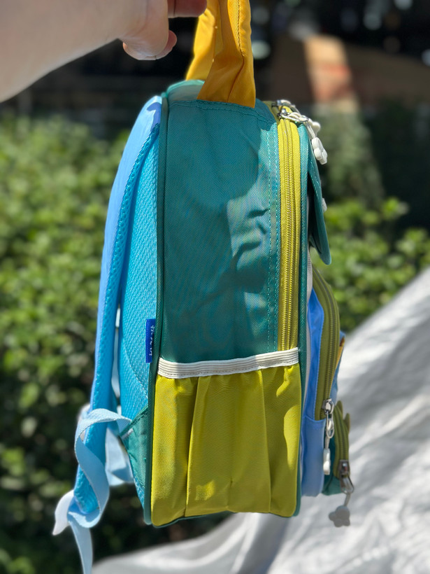 کوله بچگانه XIBEIمدل شاد جنس برزنتی